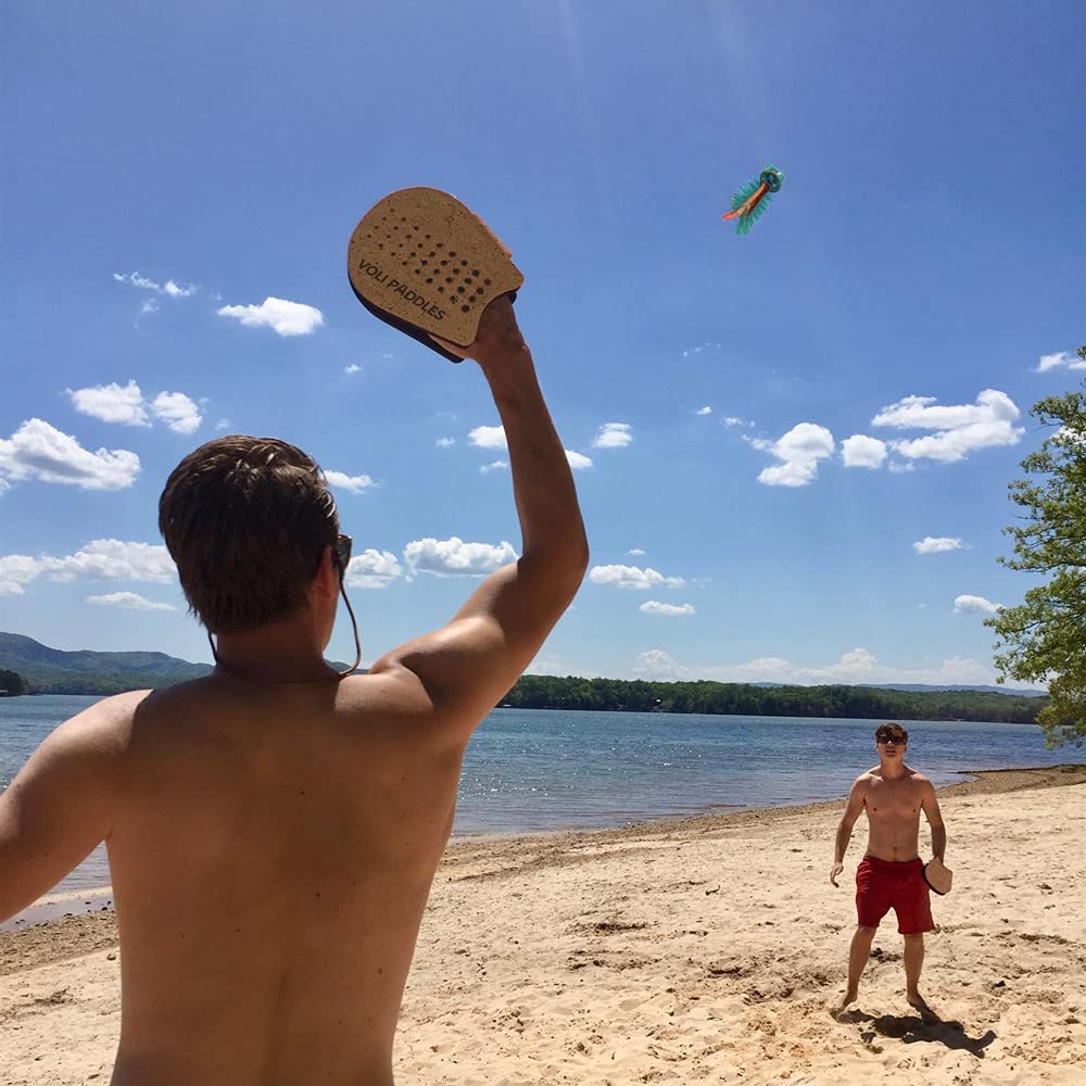 Juego de palas con flyer tipo badminton para jugar en la playa